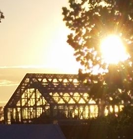 Glass conservatory at sunset